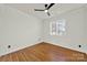Comfortable room featuring wood floors, fan, and natural light at 11000 King George Ln, Waxhaw, NC 28173