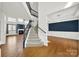 Bright open foyer with staircase and hardwood floors at 11000 King George Ln, Waxhaw, NC 28173