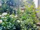 Landscaped garden with beautiful, mature plantings at 11000 King George Ln, Waxhaw, NC 28173