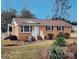 Charming brick home with a well-manicured lawn and inviting front entrance at 114 Eller Rd, Gastonia, NC 28056