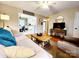 Cozy living room with hardwood floors and open layout to the modern kitchen at 114 Eller Rd, Gastonia, NC 28056