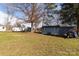 Spacious backyard with additional sheds and outbuildings at 115 Setter Ct, Statesville, NC 28625