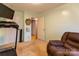 Bright bedroom with comfortable chair, treadmill, and natural light from the window at 115 Setter Ct, Statesville, NC 28625