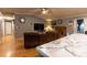 Comfortable living room with wood flooring, a brick fireplace, and neutral-colored walls at 115 Setter Ct, Statesville, NC 28625