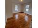 A bright bedroom with hardwood floors and plenty of space at 120 3Rd Ave, Conover, NC 28613