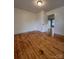 This bedroom has hardwood floors and a large closet at 120 3Rd Ave, Conover, NC 28613