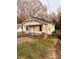 Charming single-story home with a welcoming front porch and well-maintained lawn at 120 3Rd Ave, Conover, NC 28613