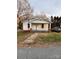 Charming home with a covered front porch and well-maintained landscaping at 120 3Rd Ave, Conover, NC 28613