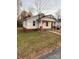 Charming single-Gathering home featuring a cozy front porch, painted white siding, and a well-maintained lawn at 120 3Rd Ave, Conover, NC 28613