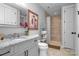 Bathroom featuring a modern vanity, granite countertop and tile shower with glass door at 129 Ryleigh Dan Pl, Mooresville, NC 28115