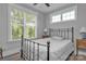 Cozy bedroom with natural light and calming decor, offering a serene retreat for restful nights at 129 Ryleigh Dan Pl, Mooresville, NC 28115