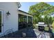 Spacious deck with outdoor dining set, grill, and screened porch access at 129 Ryleigh Dan Pl, Mooresville, NC 28115