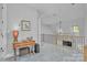 Spacious upstairs hallway with wooden banister and railing overlooking the living area at 129 Ryleigh Dan Pl, Mooresville, NC 28115