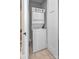 Convenient laundry area with a stackable washer and dryer, maximizing space and efficiency at 129 Ryleigh Dan Pl, Mooresville, NC 28115