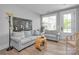 Bright living room with comfortable seating, creating a relaxing space for entertaining or unwinding at 129 Ryleigh Dan Pl, Mooresville, NC 28115