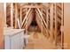 Unfinished attic with stud framing, and plumbing for a toilet and sink at 140 Rustic Way Ln, Mooresville, NC 28117