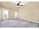 Spacious main bedroom features a ceiling fan, carpet floors and good light at 140 Rustic Way Ln, Mooresville, NC 28117