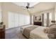 Bedroom featuring a ceiling fan, natural light and lots of closet space at 140 Rustic Way Ln, Mooresville, NC 28117