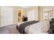 Cozy bedroom with soft carpet, an ensuite bathroom, and bright natural light at 140 Rustic Way Ln, Mooresville, NC 28117