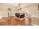 Dining area featuring a large table and hardwood floors at 140 Rustic Way Ln, Mooresville, NC 28117