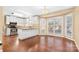 Bright kitchen featuring white cabinetry, modern appliances, and plenty of natural light at 140 Rustic Way Ln, Mooresville, NC 28117