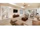 Bright and spacious living room with lots of natural light, modern furnishings, and tile floors at 140 Rustic Way Ln, Mooresville, NC 28117