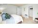 Comfortable bedroom with closet and bathroom entries, carpet, and decor at 1416 6Th Ne St, Hickory, NC 28601