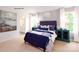 This bedroom showcases a modern design, natural light, and en-suite bathroom at 1416 6Th Ne St, Hickory, NC 28601
