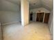 Small bedroom with hardwood floors and an exposed post in the center of the room at 148 Center St, Chester, SC 29706