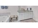 Bright bathroom with double vanity and soaking tub at 155 Autumnwood Rd, Troutman, NC 28166