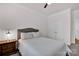 Cozy bedroom with a comfortable bed, side table, and ample natural light, offering a peaceful retreat at 155 Autumnwood Rd, Troutman, NC 28166