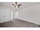 Spacious bedroom with double closets, carpet flooring, and abundant natural light at 155 Autumnwood Rd, Troutman, NC 28166