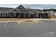 Exterior view of the community clubhouse with covered entry at 155 Autumnwood Rd, Troutman, NC 28166