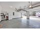 Spacious garage with painted floor and houses utility connections at 155 Autumnwood Rd, Troutman, NC 28166
