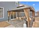 Outdoor seating area with dining table and grill for entertaining at 155 Autumnwood Rd, Troutman, NC 28166