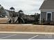 Neighborhood playground with slides and play structures at 155 Autumnwood Rd, Troutman, NC 28166