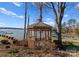 Backyard featuring a gazebo sitting in a yard with trees and water view at 274 Greenbay Rd, Mooresville, NC 28117