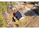 Aerial view of backyard with a patio, hot tub and a wooded area at 3041 Mulberry Ln, Lancaster, SC 29720