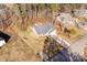 Overhead aerial view of a single Gathering home with a long driveway and a tree filled lot at 3041 Mulberry Ln, Lancaster, SC 29720