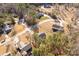 An aerial view shows multiple homes within a neighborhood surrounded by mature trees and landscaping at 3041 Mulberry Ln, Lancaster, SC 29720
