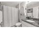 Cozy bathroom with a shower-tub combo, granite countertop and white cabinets at 3041 Mulberry Ln, Lancaster, SC 29720