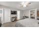 Cozy bedroom featuring a ceiling fan, large television, and neutral tones for a relaxing retreat at 3041 Mulberry Ln, Lancaster, SC 29720
