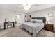 Comfortable bedroom with a neutral palette, large bed, and cozy furnishings for a relaxing space at 3041 Mulberry Ln, Lancaster, SC 29720