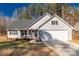 Charming single-Gathering home with a welcoming front porch and attached two-car garage at 3041 Mulberry Ln, Lancaster, SC 29720