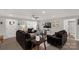 Spacious living room featuring a cozy fireplace and large windows at 3041 Mulberry Ln, Lancaster, SC 29720