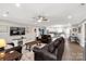 Open concept living room that flows into kitchen and eat in dining area with hardwood flooring at 3041 Mulberry Ln, Lancaster, SC 29720