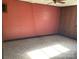 Bedroom featuring panel walls, neutral paint, and carpet flooring at 314 Little St, Lincolnton, NC 28092