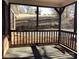Relaxing screened porch with natural light and views of the surrounding greenery at 314 Little St, Lincolnton, NC 28092