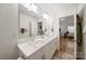 Bathroom with double sinks and modern fixtures at 3899 Center Place Dr, Harrisburg, NC 28075
