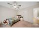 Bedroom with a bed, nightstand, and plush carpet at 3899 Center Place Dr, Harrisburg, NC 28075